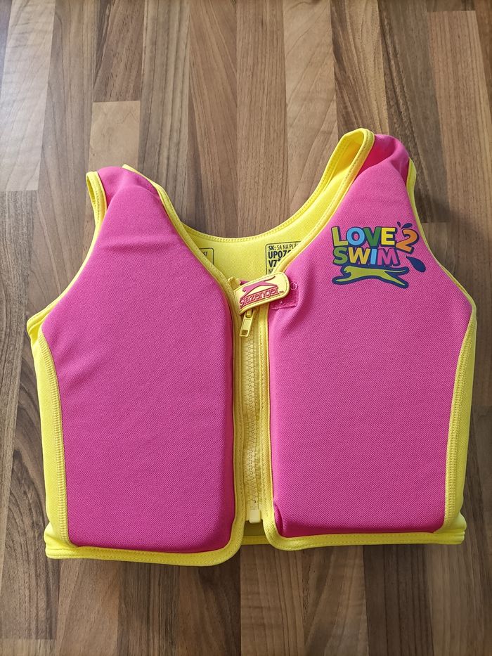 Gilet flottaison rose et jaune 18-30 kg