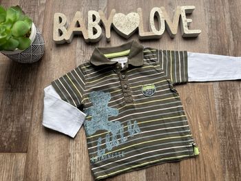 - Polo Lulu castagnettes  - 6 mois - Très bon état