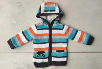 Gilet veste très chaud et tout doux. État neuf. Taille 9 mois. Orchestra