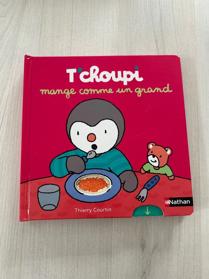 T’choupi mange comme un grand