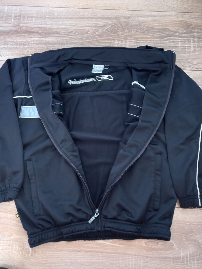 Veste de jogging bleu marine marque Reebook taille 10 ans - photo numéro 2