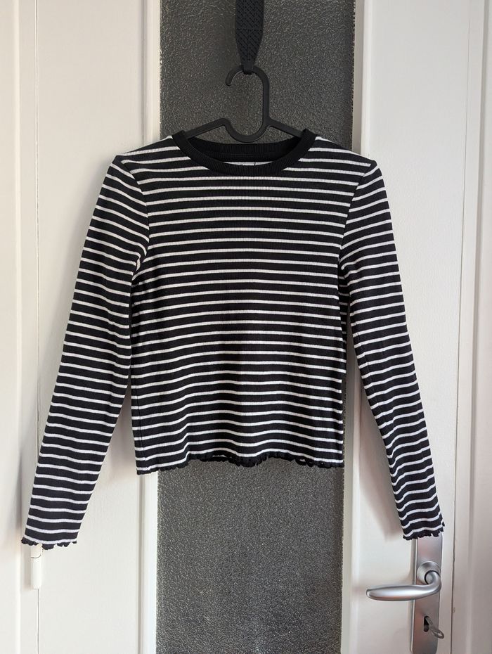 Manche longue rayé noir et blanc gémo taille 16 ans