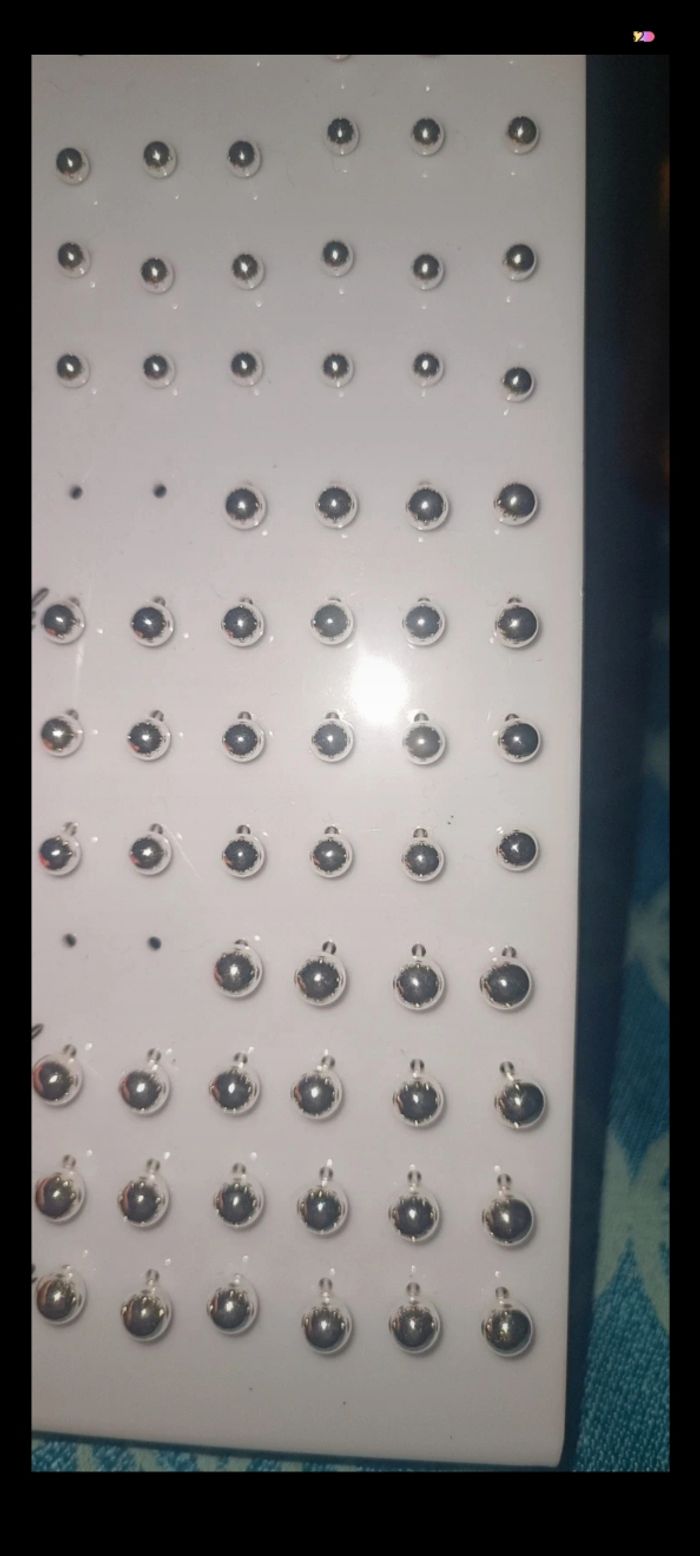 Boucle d'oreille argenté - photo numéro 3