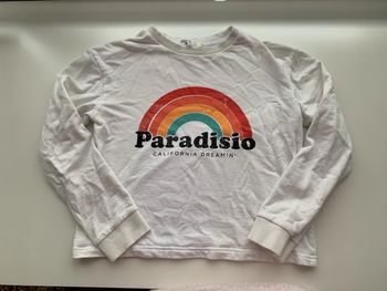 Pull Paradisio Deeluxe 14 ans .