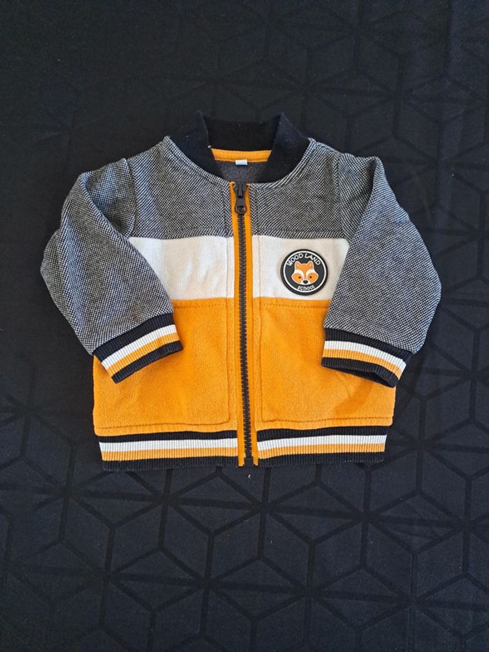 Veste demi saison renard moutarde et noire 3 mois