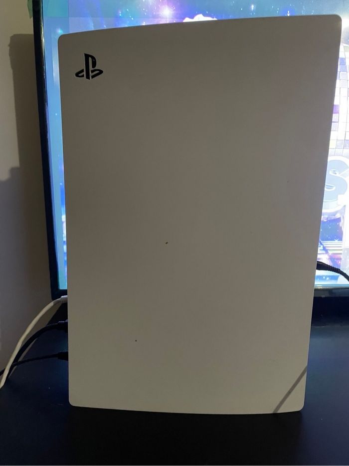 PS5 + jeux et manette - photo numéro 2