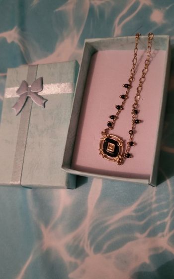 Bracelet doré et noir