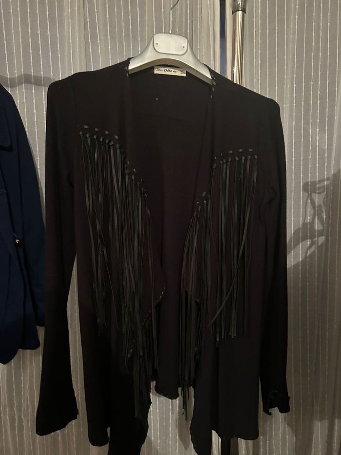 Veste noire à franges