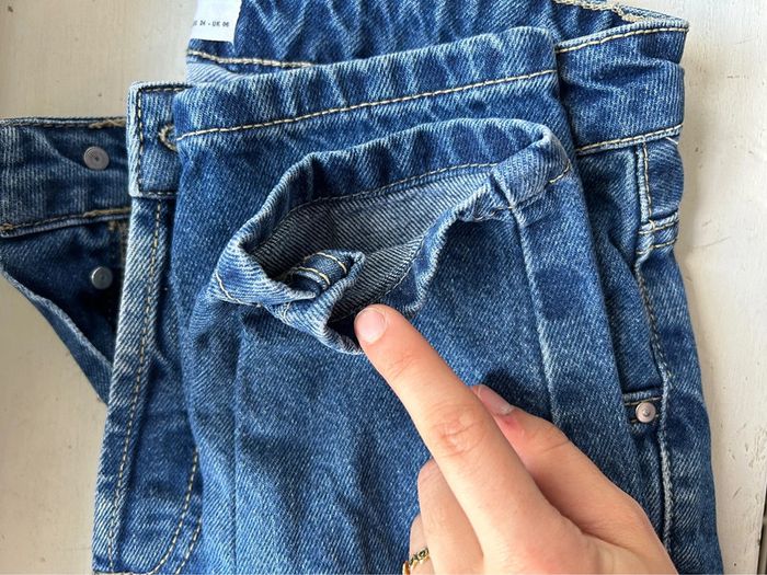 482 - jeans bleu foncé avec braguette à boutons et retaillé - photo numéro 8