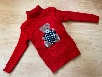 Beau pull rouge à col roulé T. 8 ans fille TBE