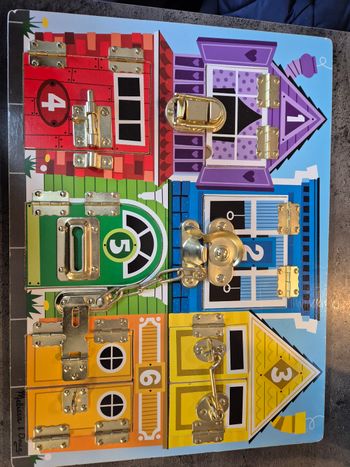 Planche d activité serrure en bois mélissa et doug