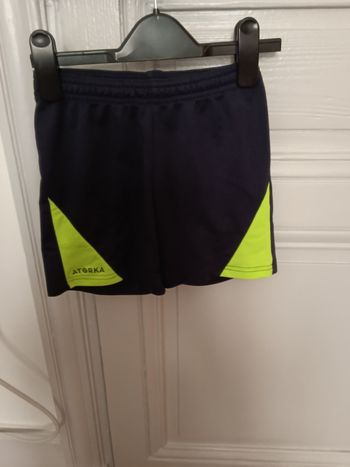 Short decathlon marine et jaune fluo