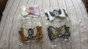 1 pince au choix poupee lol