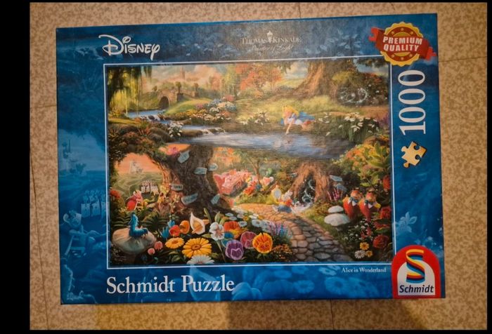 Puzzle disney schmidt 1000 pièces "Alice aux pays des merveilles "