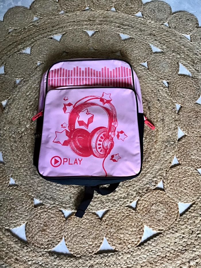 Très beau sac à dos rose et noir marque Sound Wave 30-43 cm