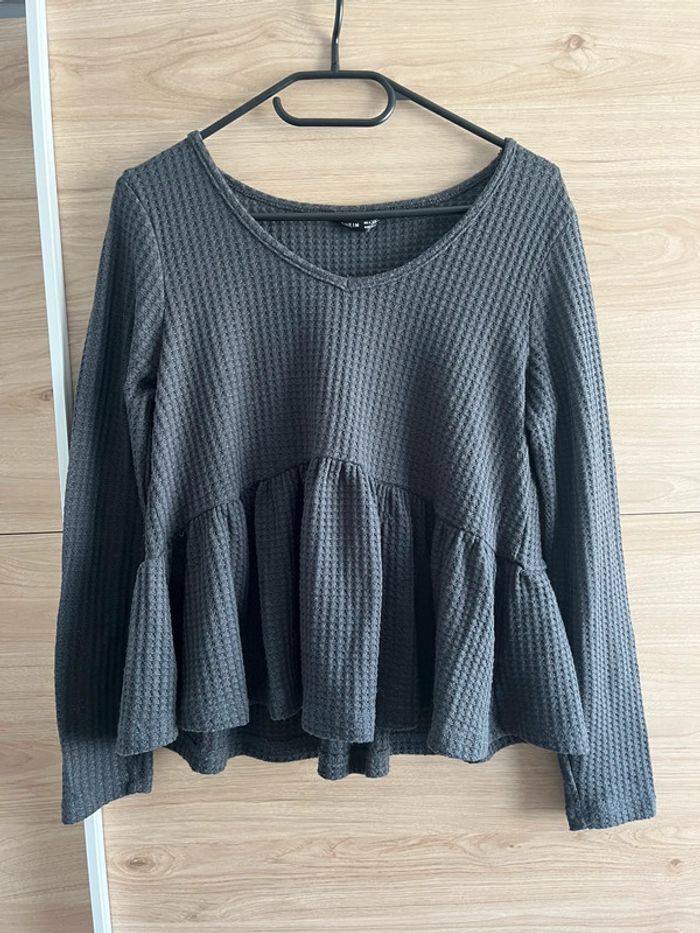 Top peplum noir taille M