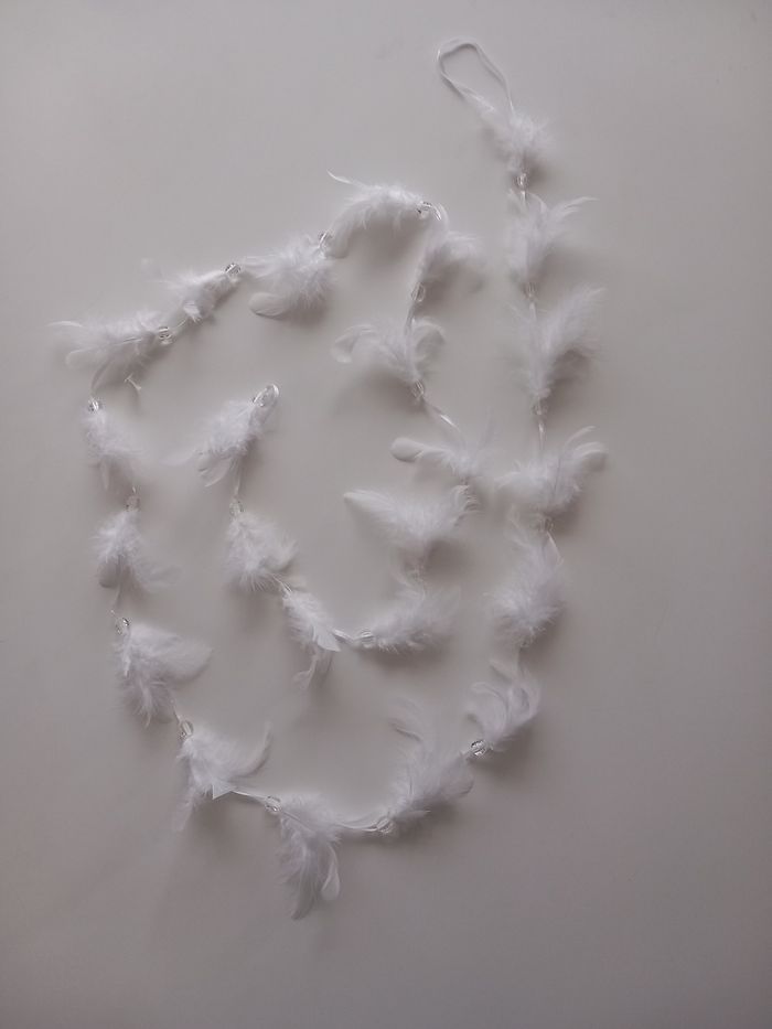 Guirlande plumes et perles