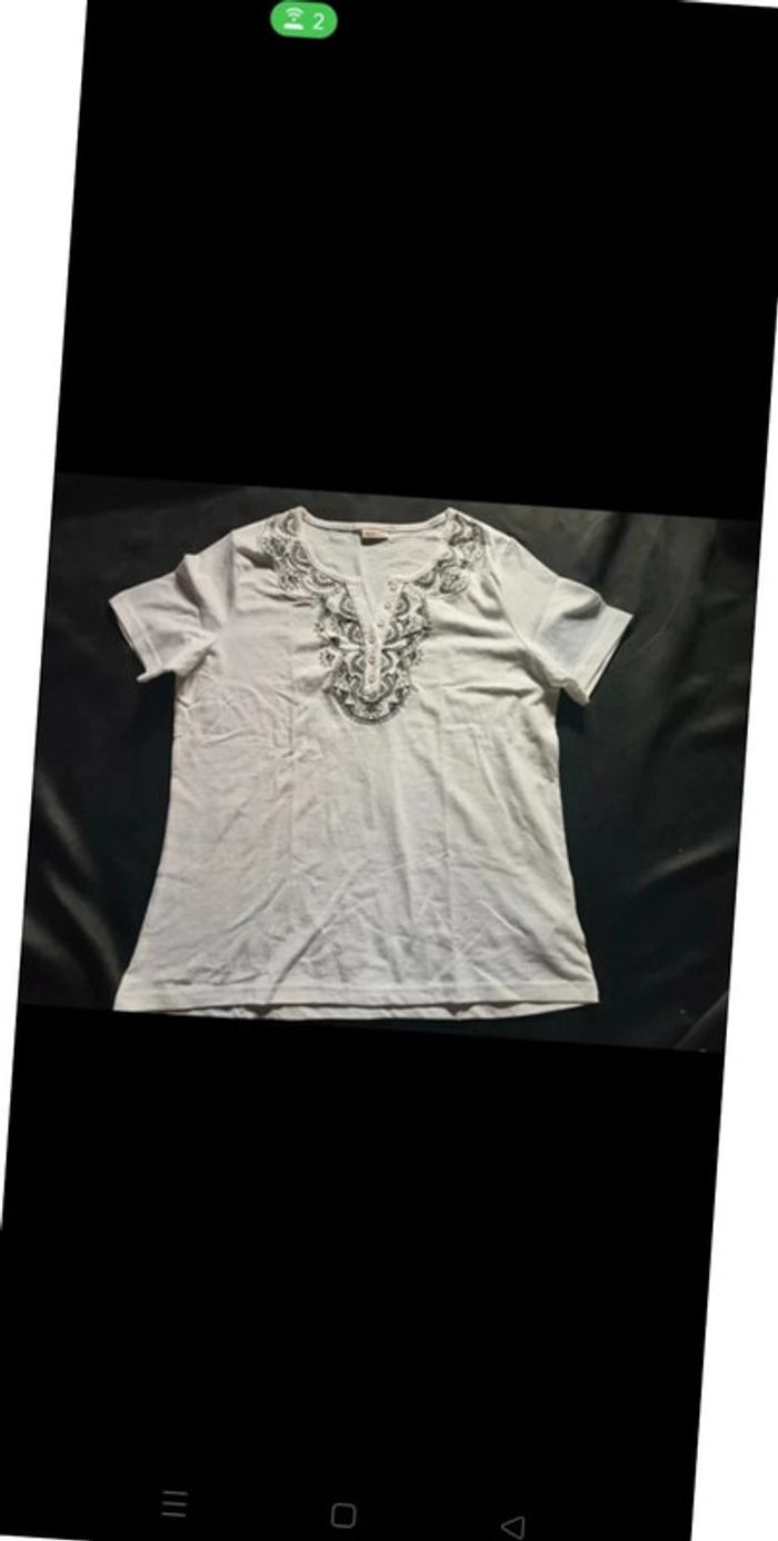 Jolie haut Damart 40/42