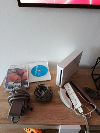 Wii avec 3 jeux et câbles