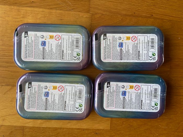 Pokémon Lot de 4 Mini tin évolutions Prismatiques - photo numéro 2