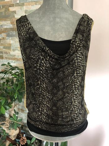 Haut long noir et doré 38