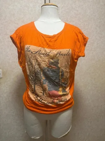 Blouse taille 42-44 marque new tilt