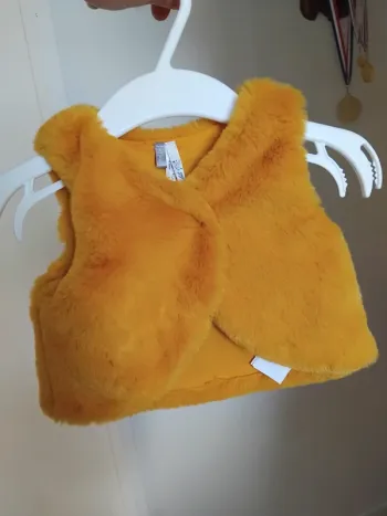 Gilets fausse fourrure fille 3mois