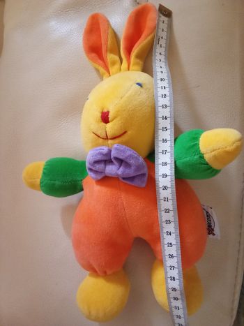 Doudou lapin jaune orange vintage d'occasion marque Nicotoy