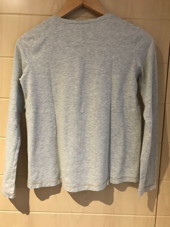 T-shirt manches longues Catimini fille (12 ans). Très bon état.