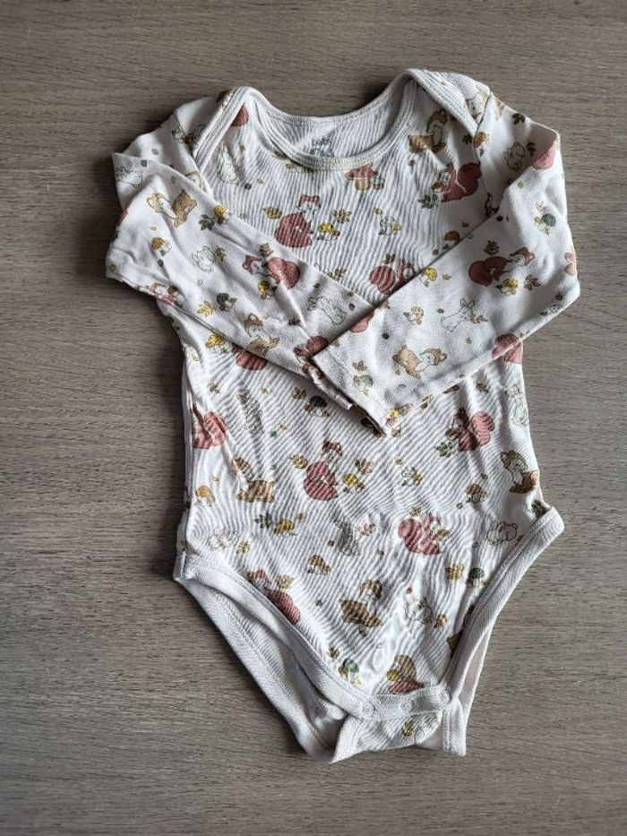 Joli body beige avec animaux de la forêt