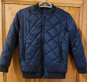 Veste matelassée marine 9/10 ans