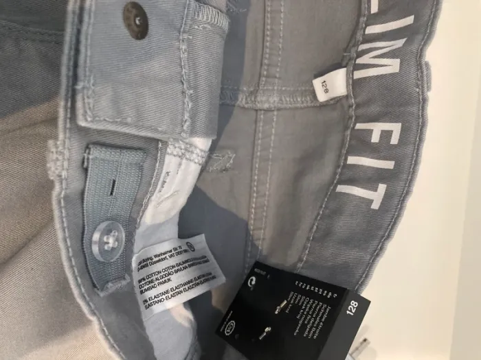 8 ans - Pantalon jean stretch gris neuf avec bouton de réglage à l'intérieur - photo numéro 6