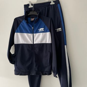 Jogging 12 ans  xxs comme neuf porté une seule fois
