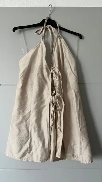 Top beige dos nu