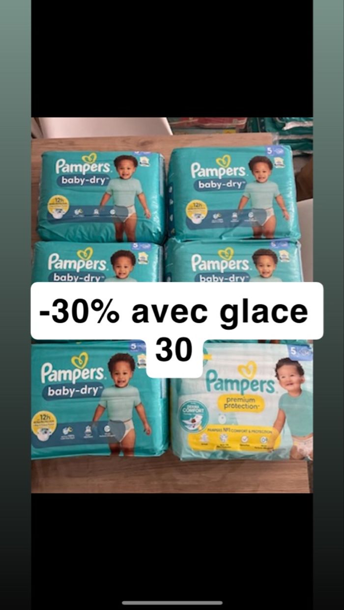 Six paquets de couches Pampers taille 5