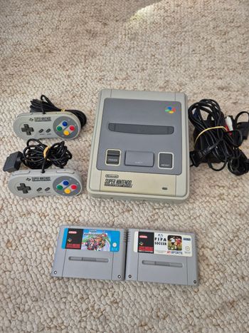 Console snes super nintendo et jeux