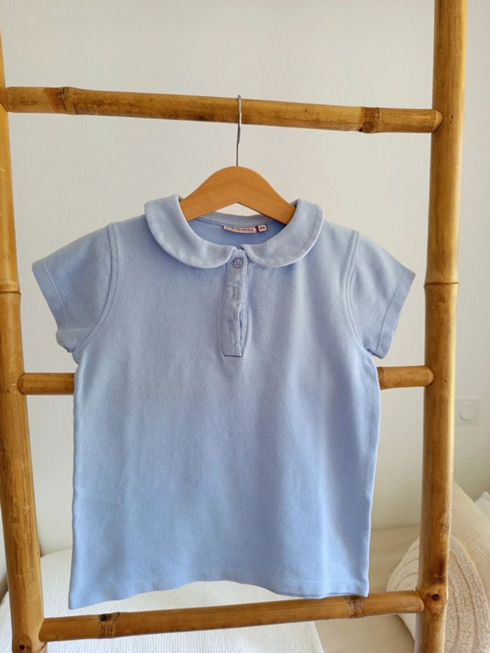 Polo bleu clair Acanthe 8 ans