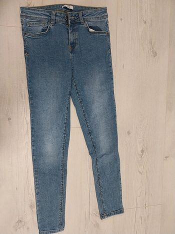 Jean bleu fille taille 34 = 12 ans