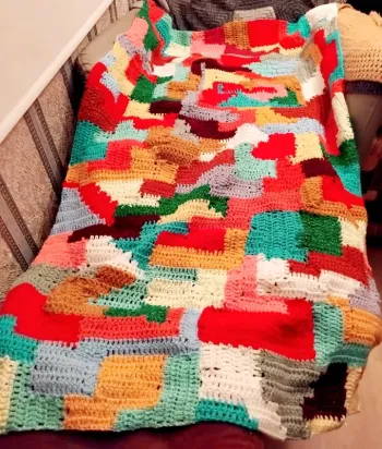 Couverture faite main au crochet multicolore en acrylique