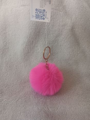 Porte clé pompon de sac LG import
