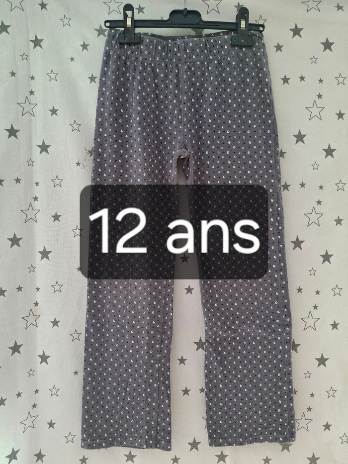 Pantalon taille élastique gris avec impression noir et blanche 12 ans Orchestra 
Très bon état ni trous ni tache