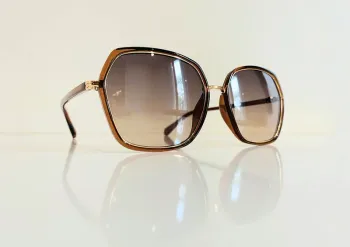 Lunette de soleil femme marron miel contour doré uvprotection catégorie 2