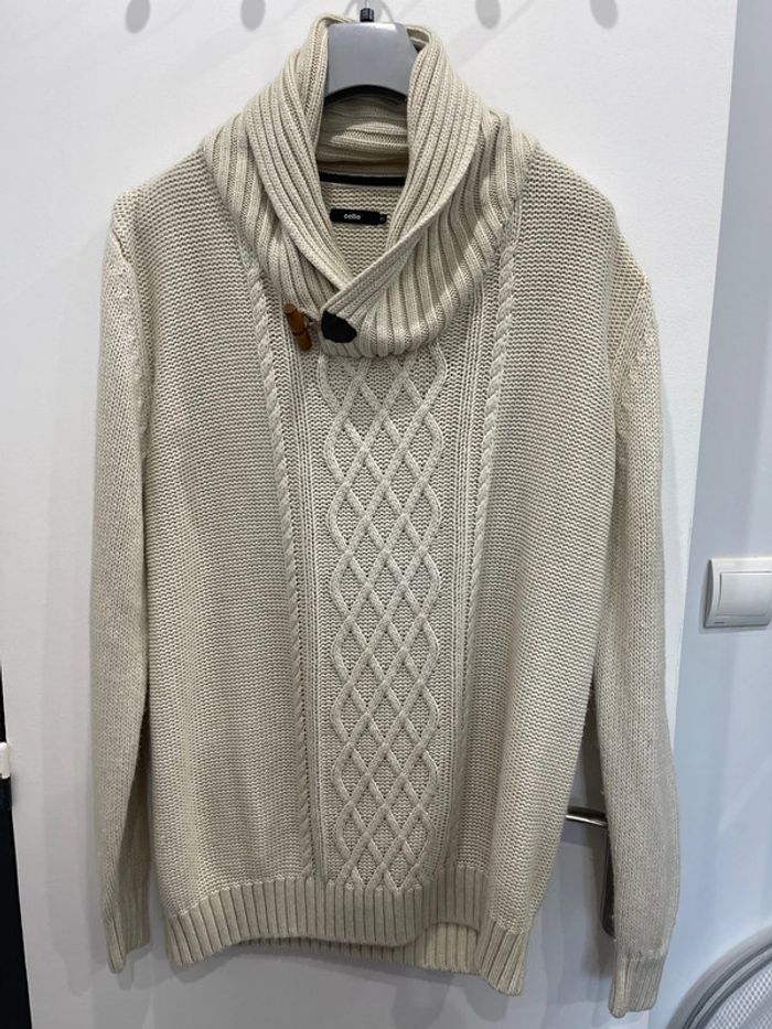 Pull col roulé