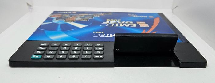 Calculatrice / convertisseur. 
Emtec.
Basf.
23x21cm - photo numéro 2