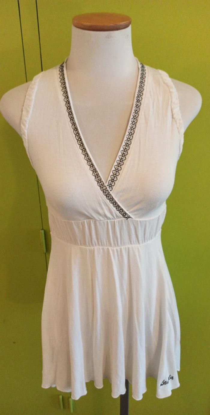 Lot des bluses asimétriques la noir est xs la blanche, et la bleue s/m - photo numéro 3