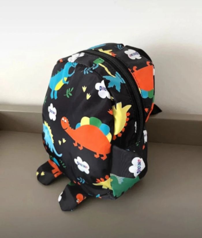 Mignon sac à dos avec dinosaures