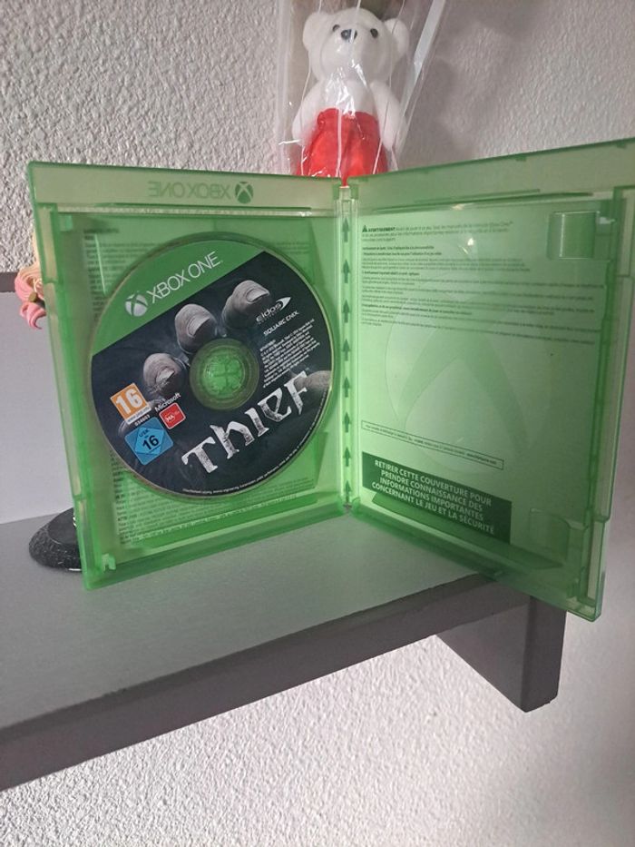 Jeu xbox one thief comme neuf - photo numéro 2