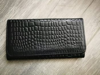 Porte feuille noir en cuir de vachette