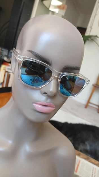 Lunettes de soleil monture transparente glace bleu