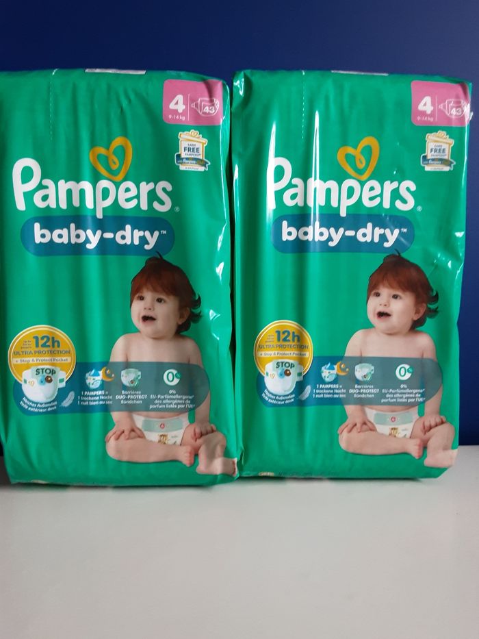 2 paquets de couches pampers T 4 (9-14 kg)